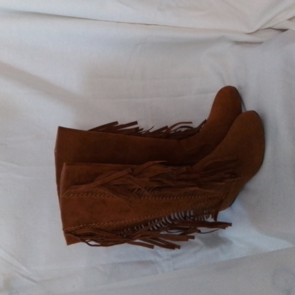 Zippered moccasin type boots